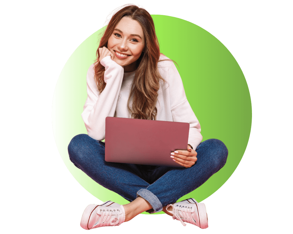 happy female student with laptop on her legs